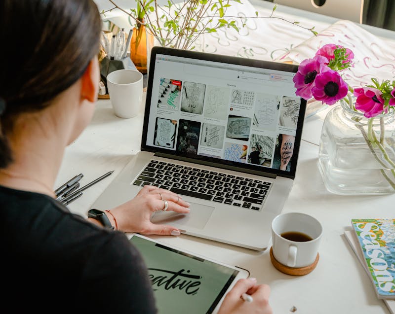 a woman working on her computer